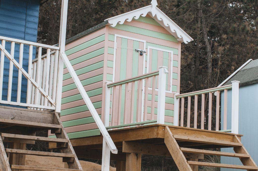 Pastel beach hut on stilts