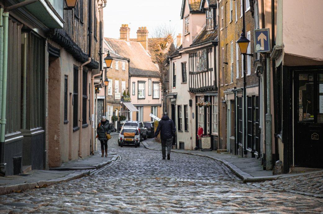 Cobblestone street with sunlight