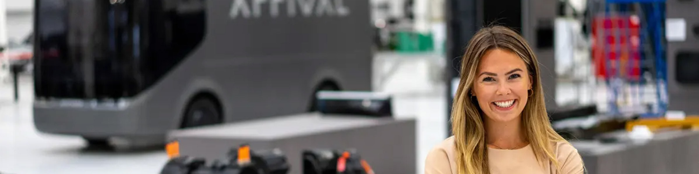 Woman charging electric car