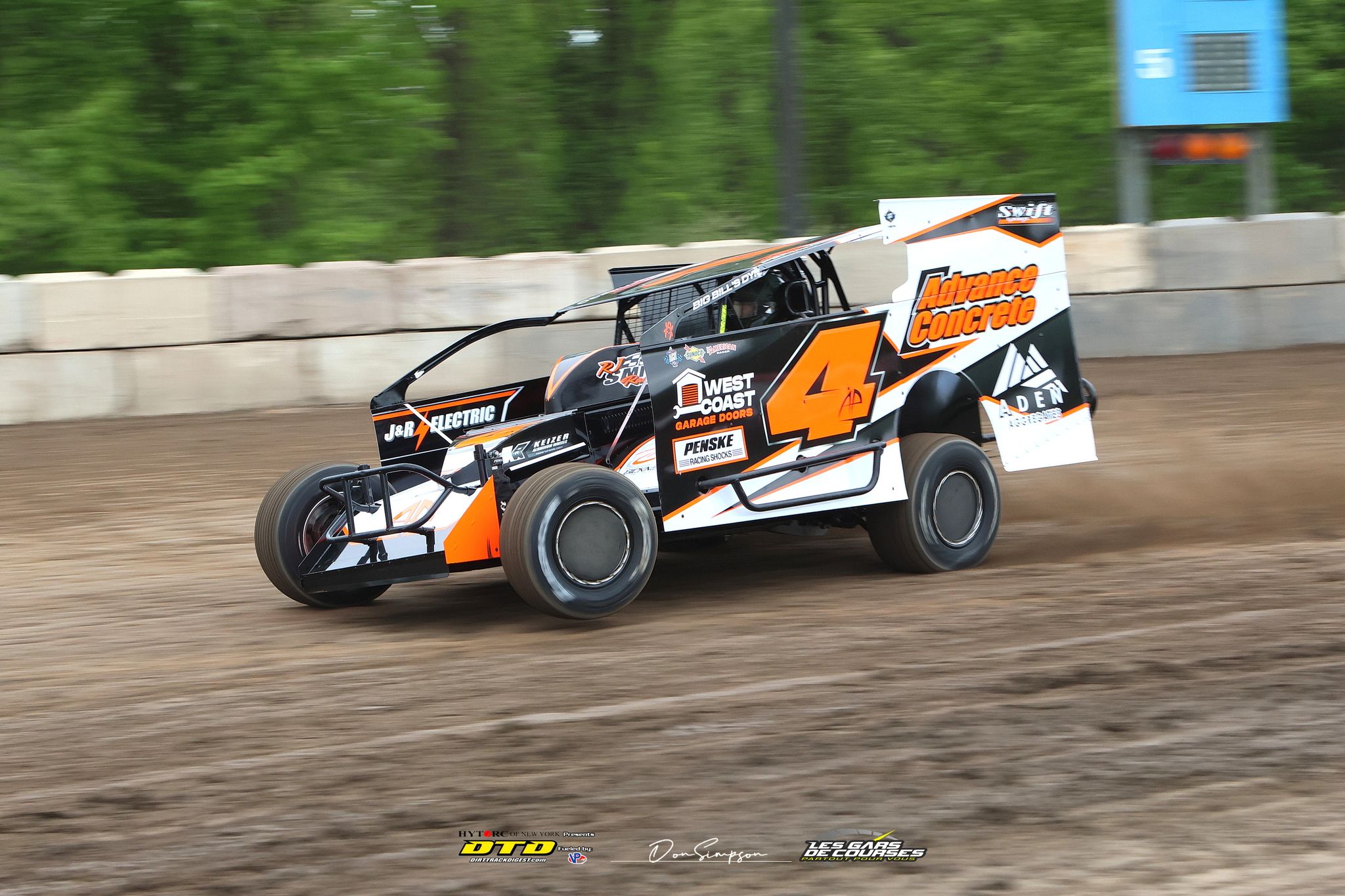 Orange-black dirt track racing car