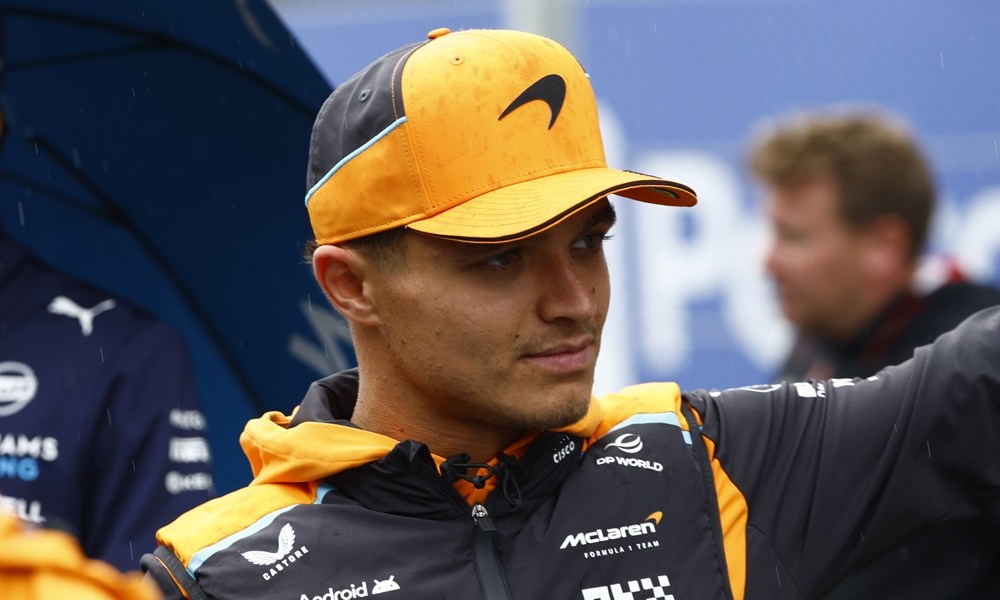 Man wearing McLaren F1 team cap