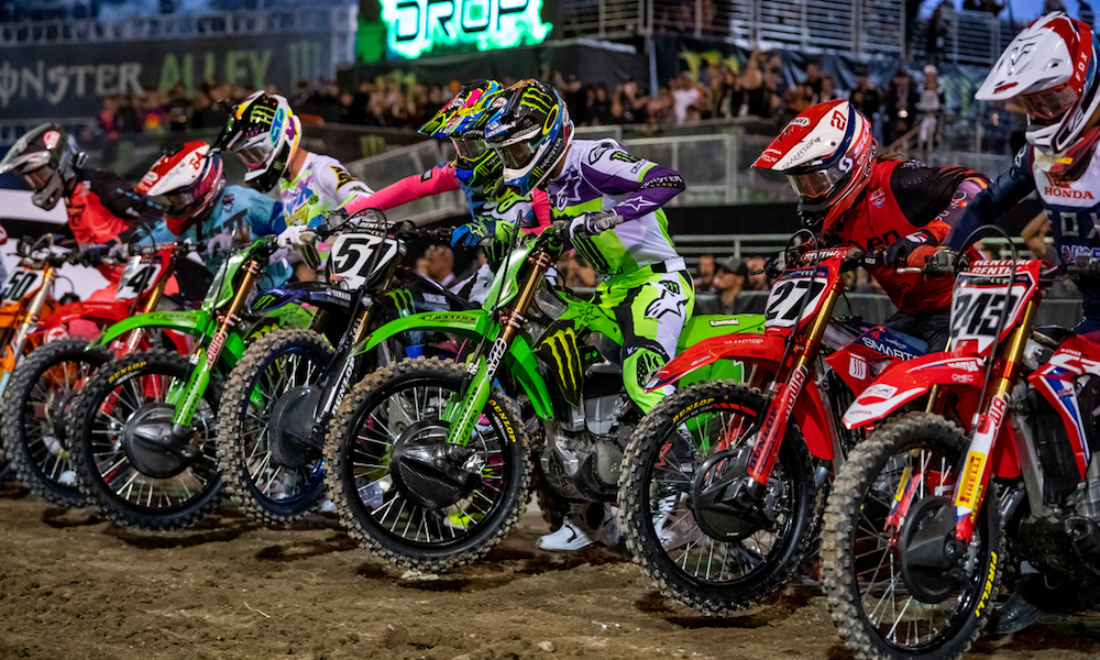 Supercross racers lined up before start