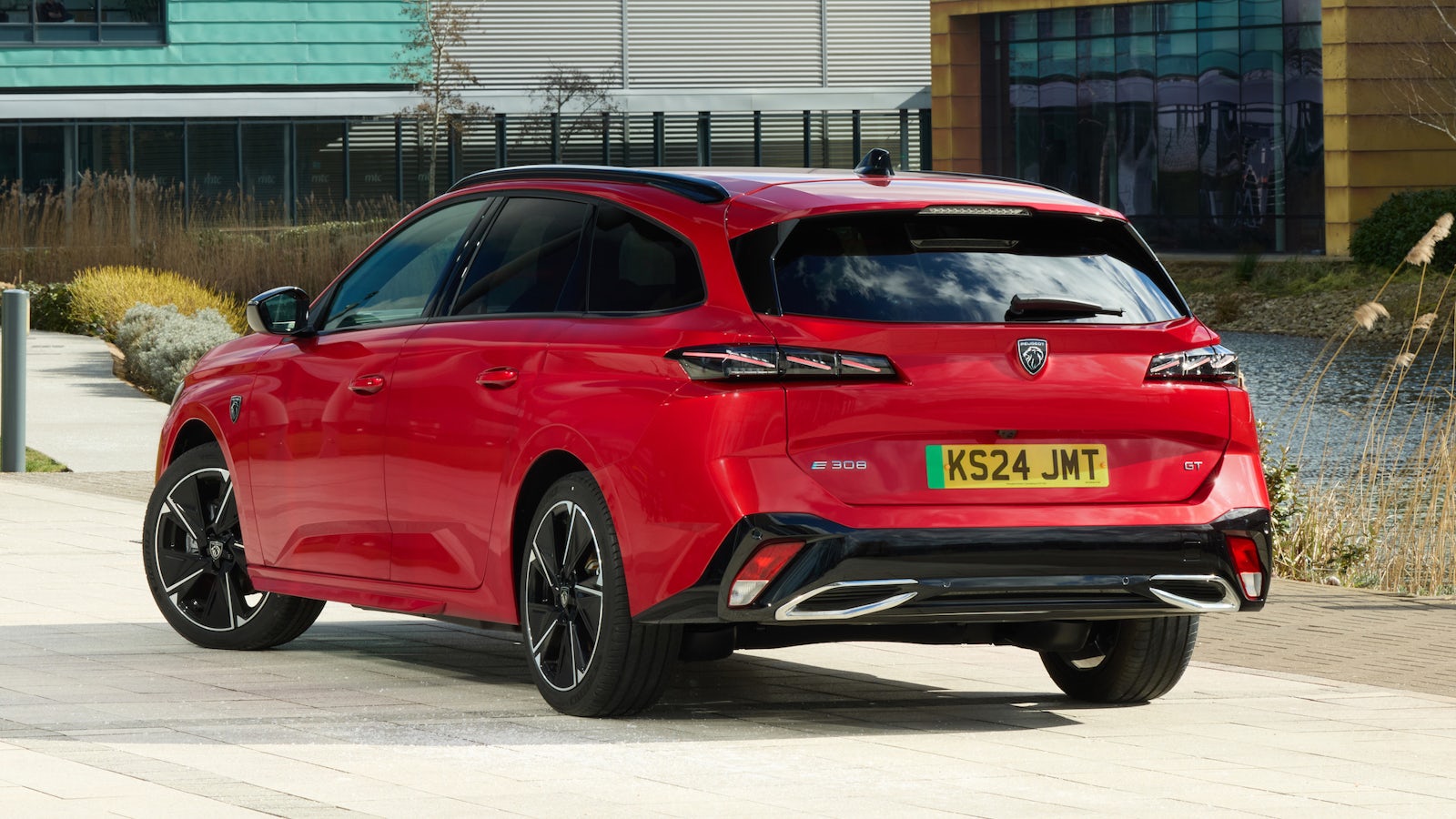 Red Peugeot E-308 SW rear view