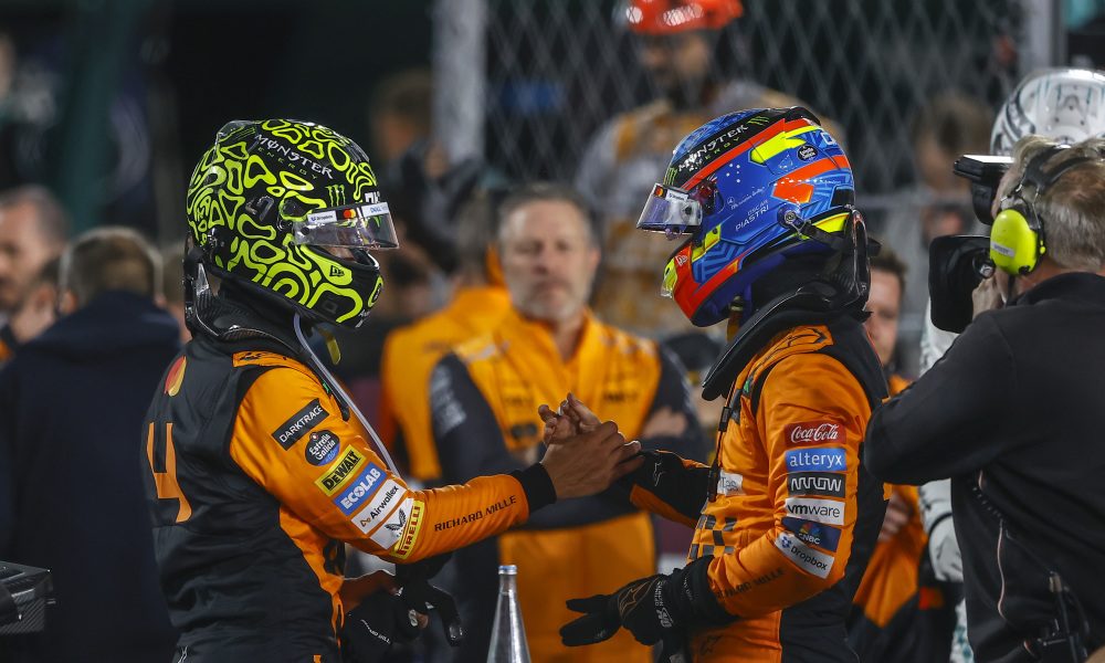 Two racers handshake at Grand Prix