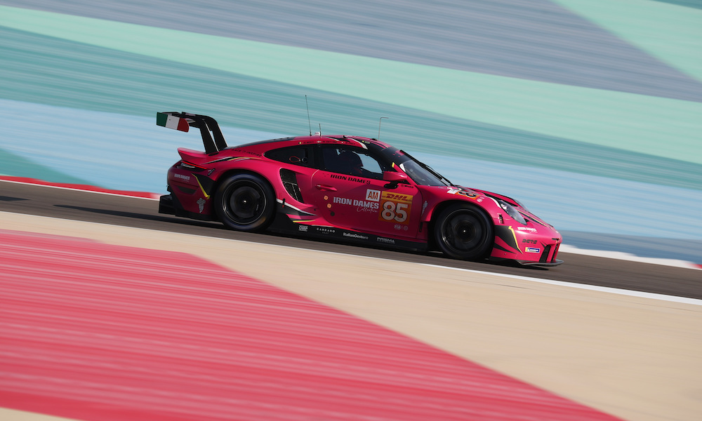 Pink Porsche race car speeding