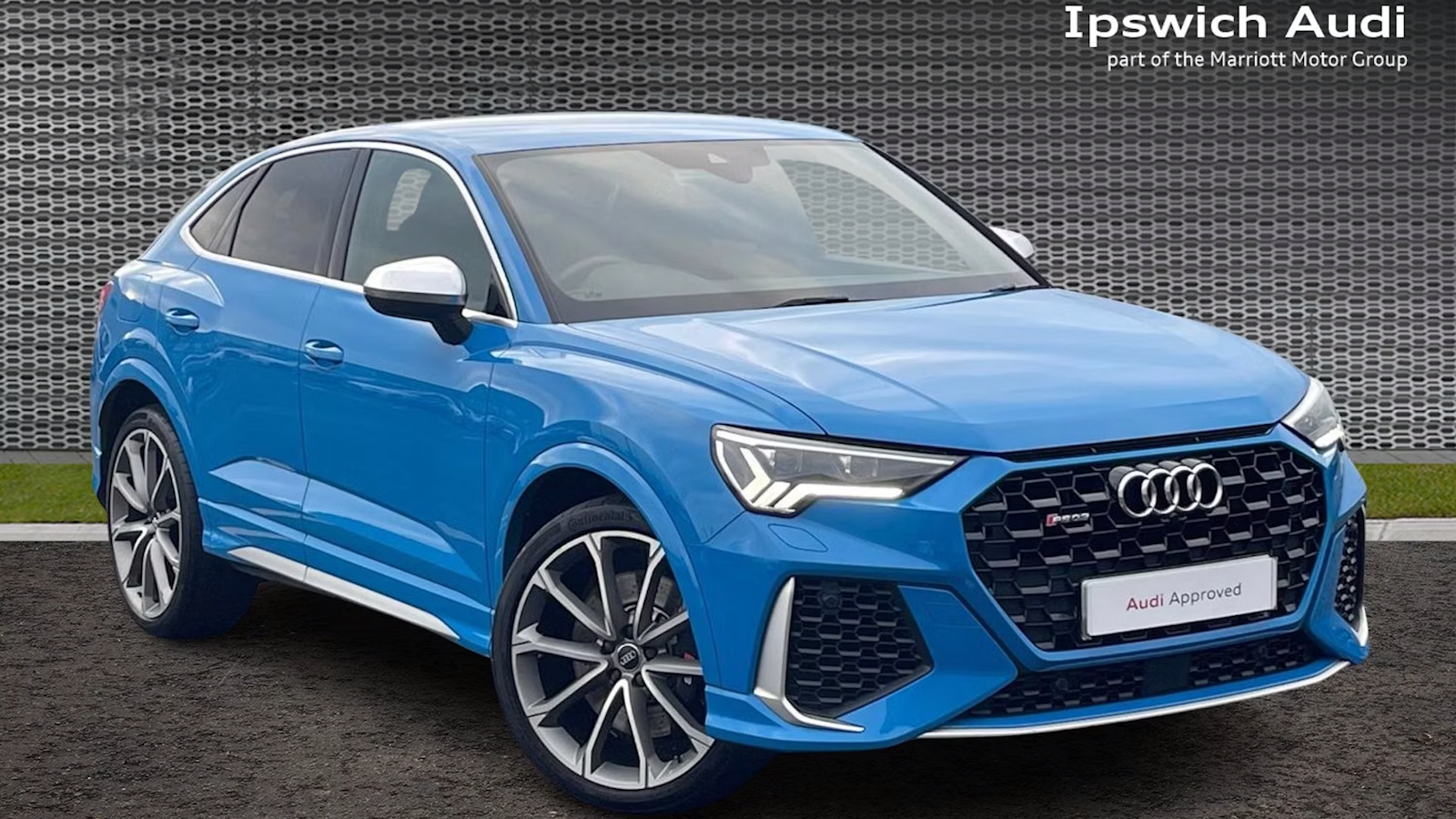 Blue Audi RS Q3 front view