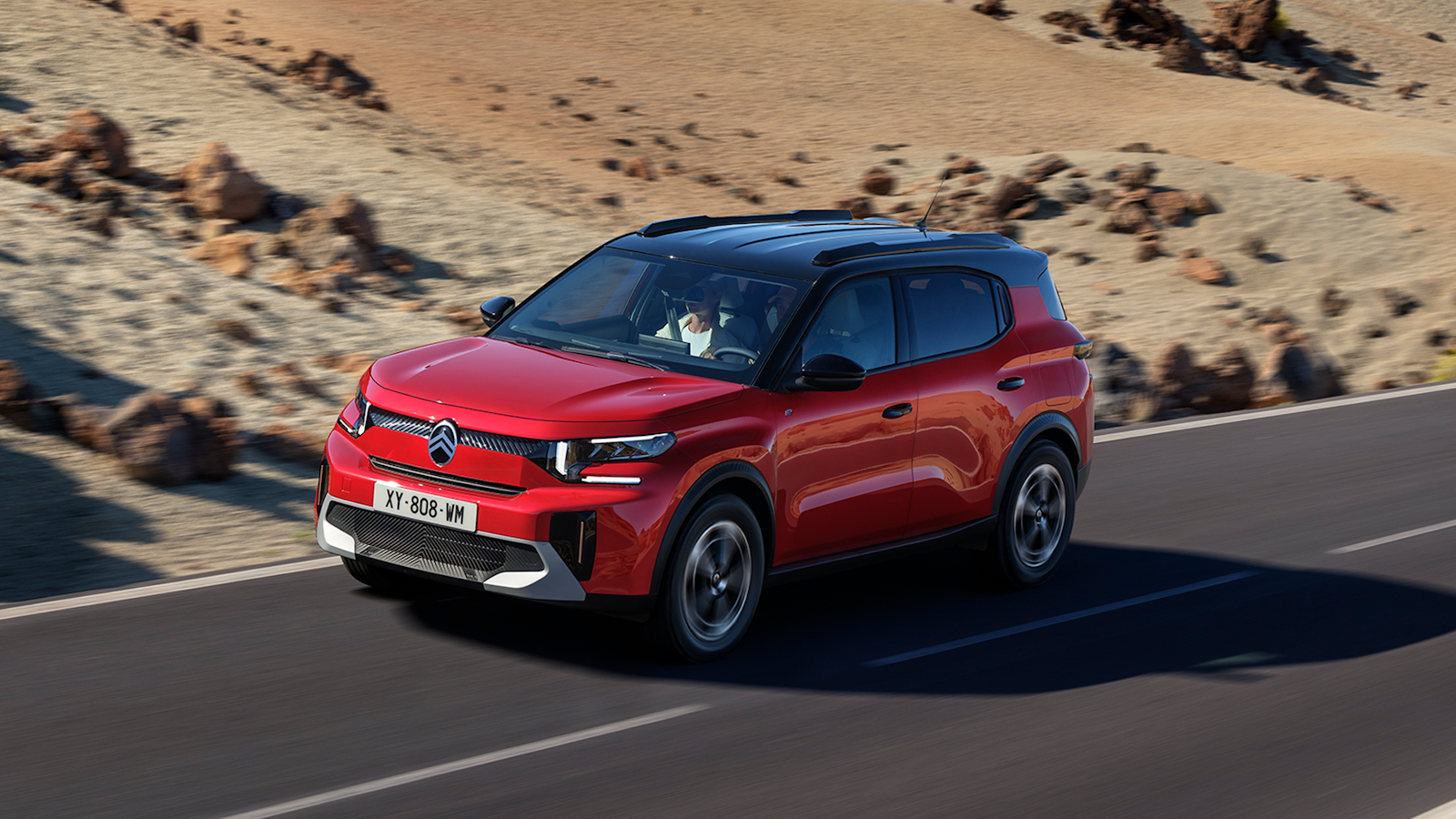 Red Citroen C3 Aircross driving forward