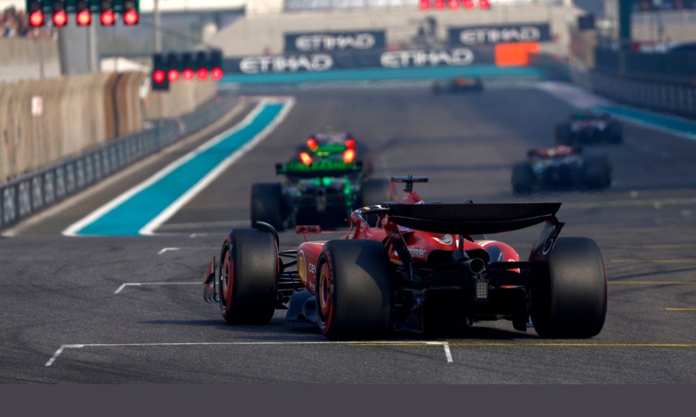 Red IndyCar racing on track