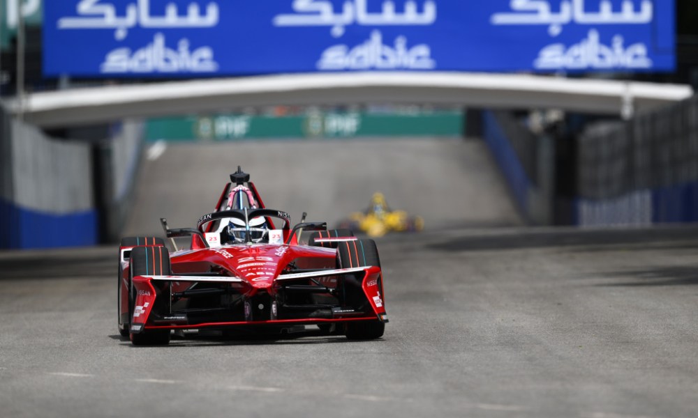 Red race car on racing track