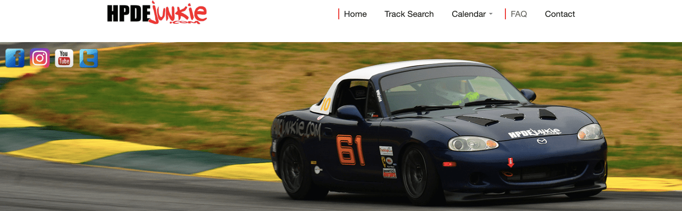 Race car on track at sunset