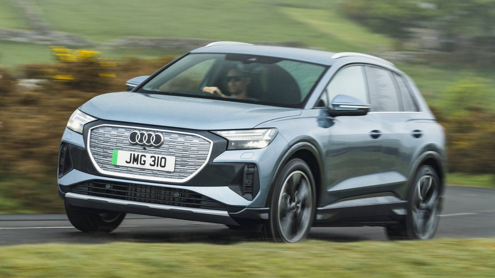 Silver Audi Q4 e-tron driving