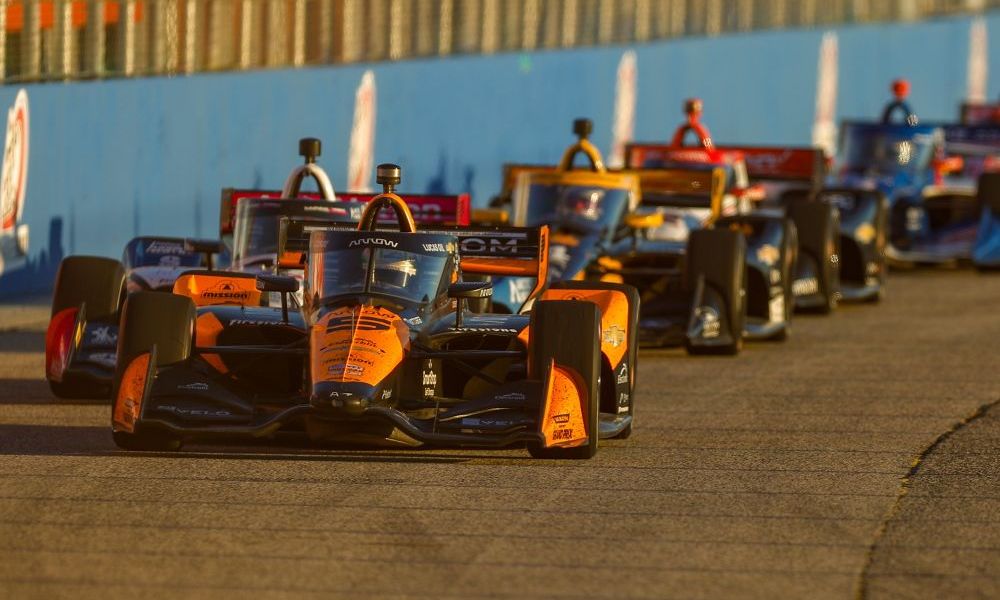 Race cars lined up on track