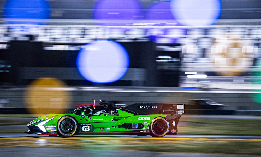 Green Cadillac prototype racing at Daytona