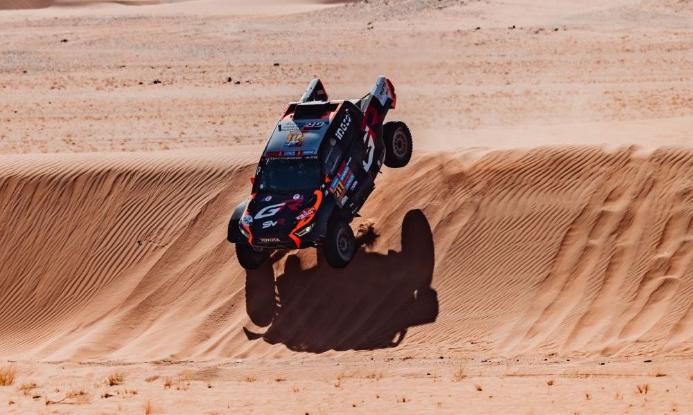 Red race car in desert