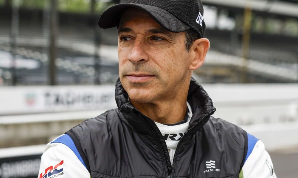 Man wearing hat at racing event