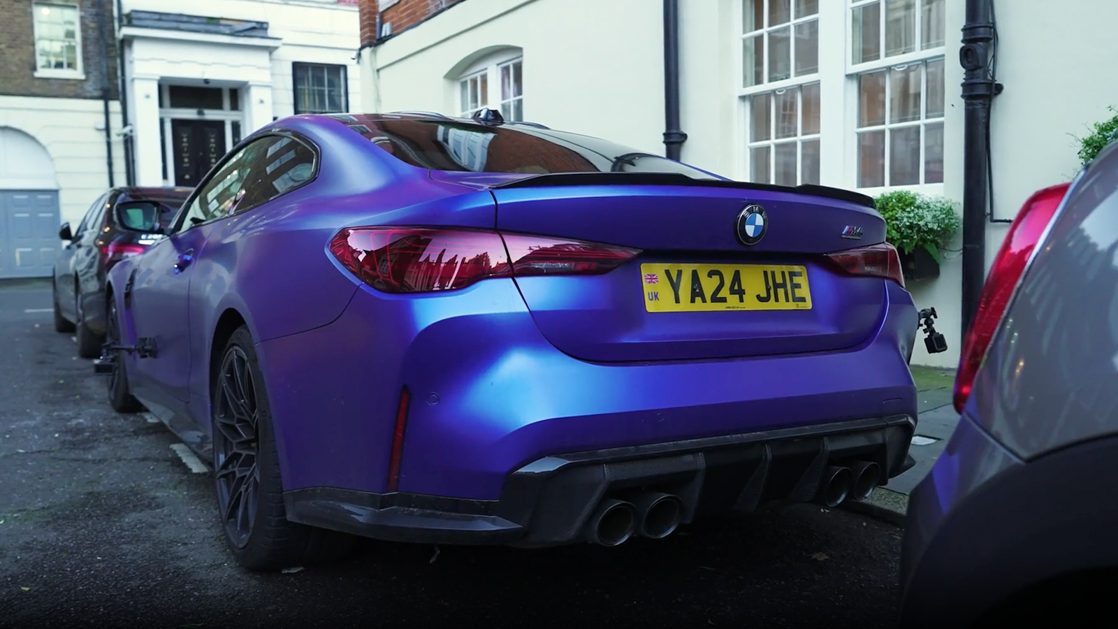 BMW M4 parked on street