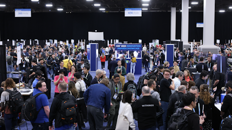 Visitors at CES technology exhibition booth