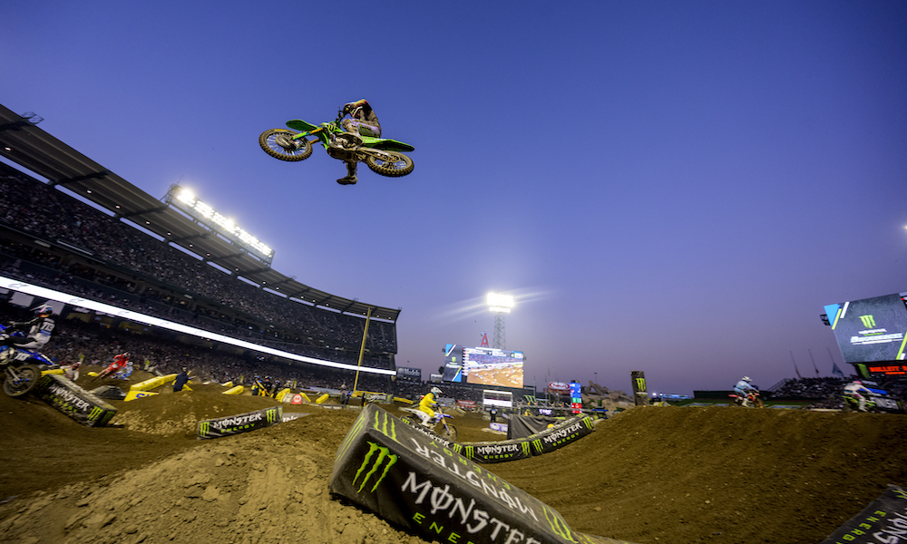 Motocross rider airborne at Anaheim Supercross