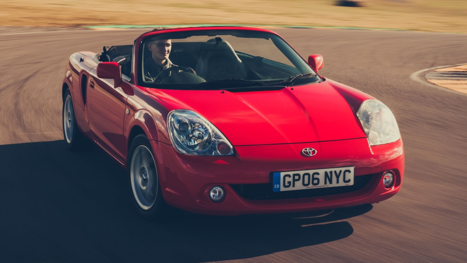 Red Toyota MR2 SW20 side view