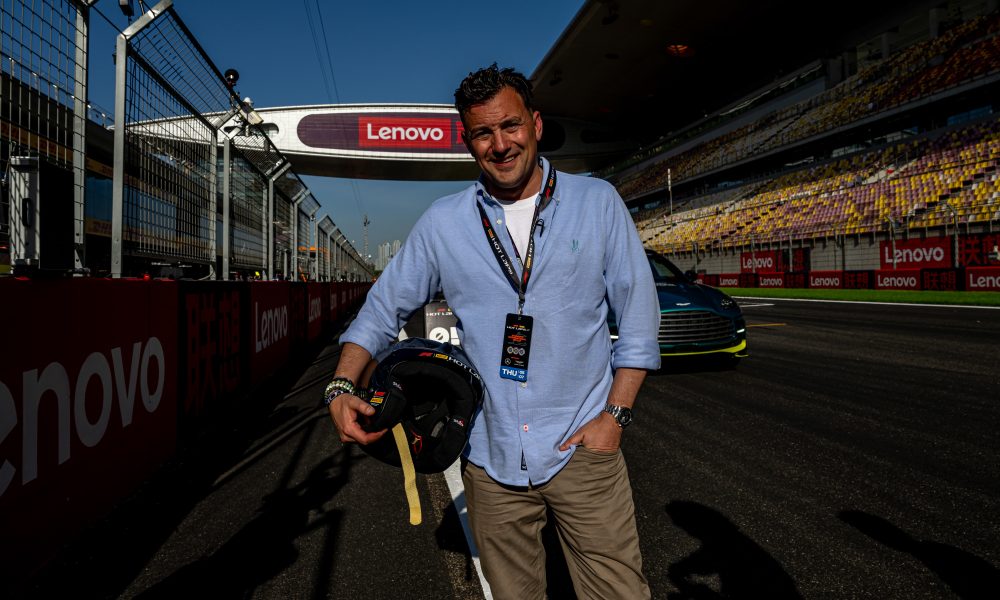 Blue-shirted man on racing track