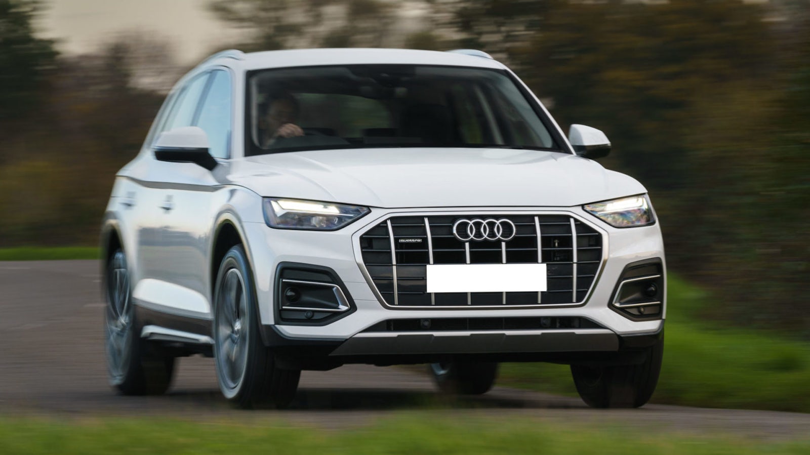 White Audi Q5 on road