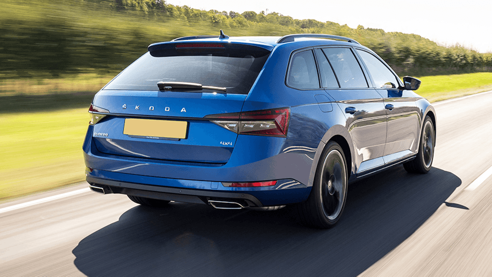 Blue Skoda Superb on road