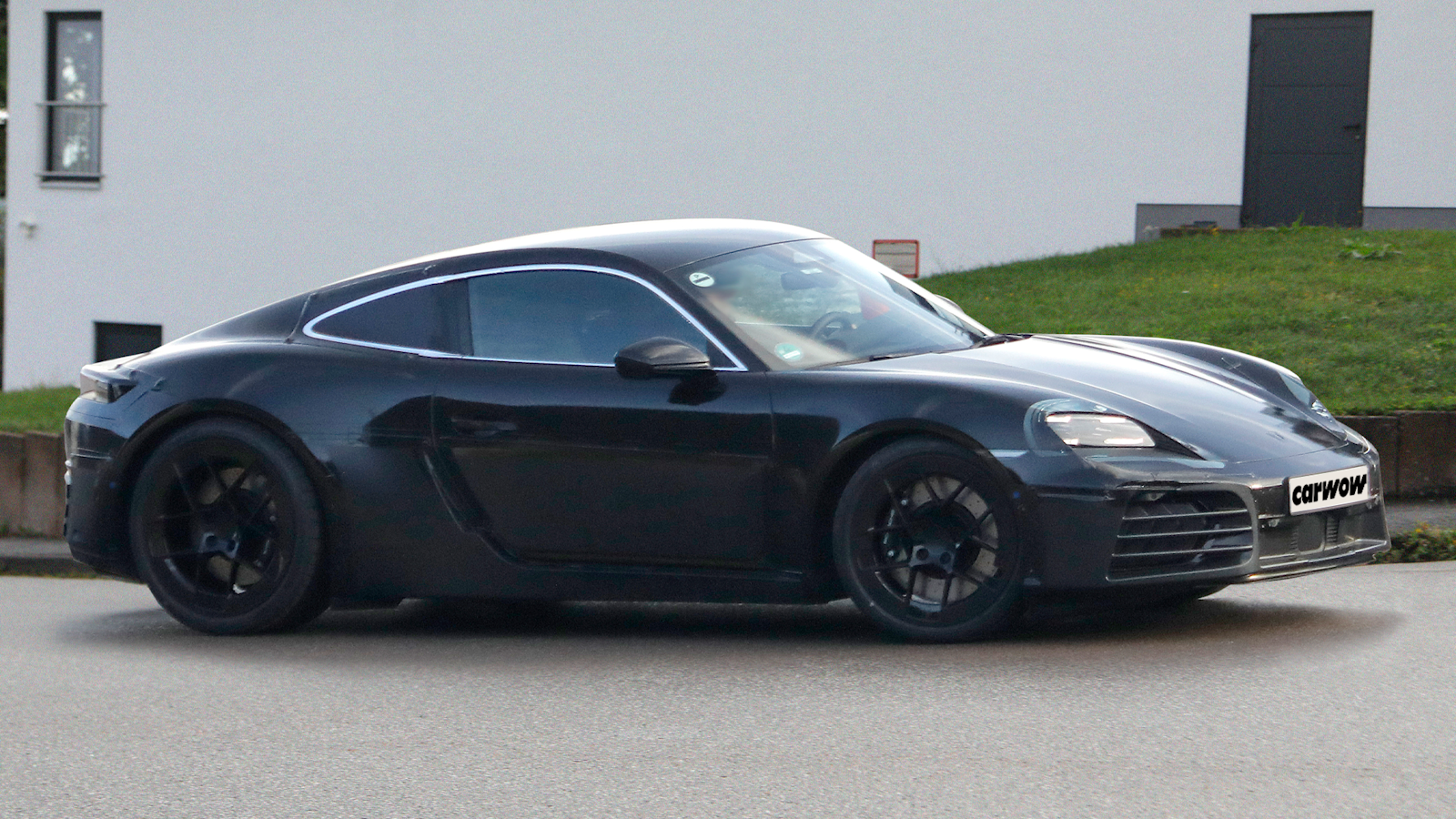 Black Porsche Cayman side profile