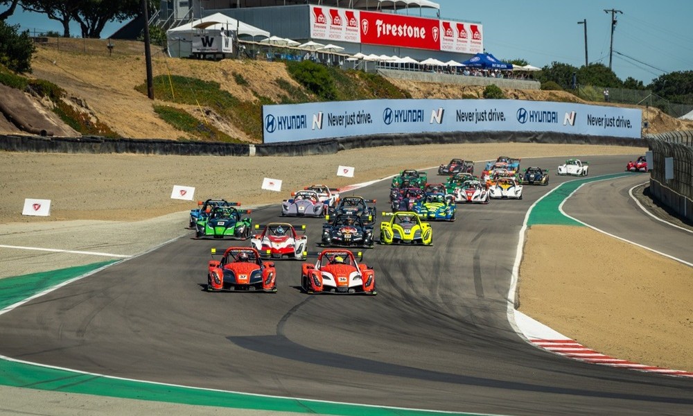 Race cars competing at Laguna Seca