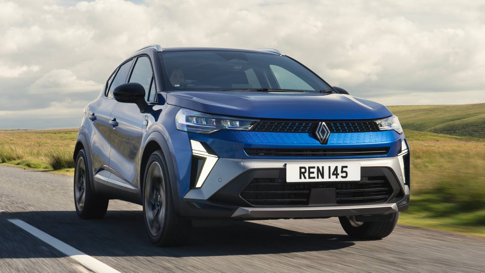 Blue Renault Captur on road