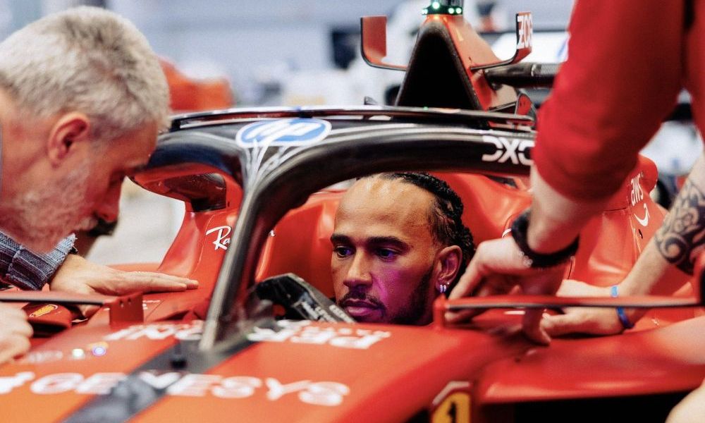 Race driver in car cockpit