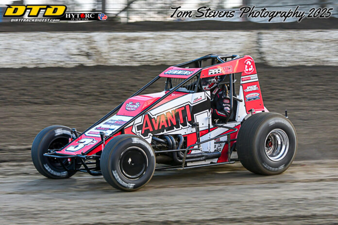 Sprint car racing on dirt track