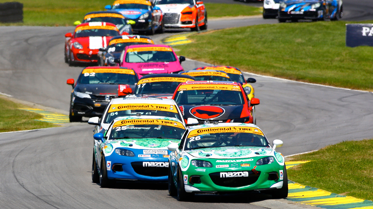 Mazda racecars compete on track