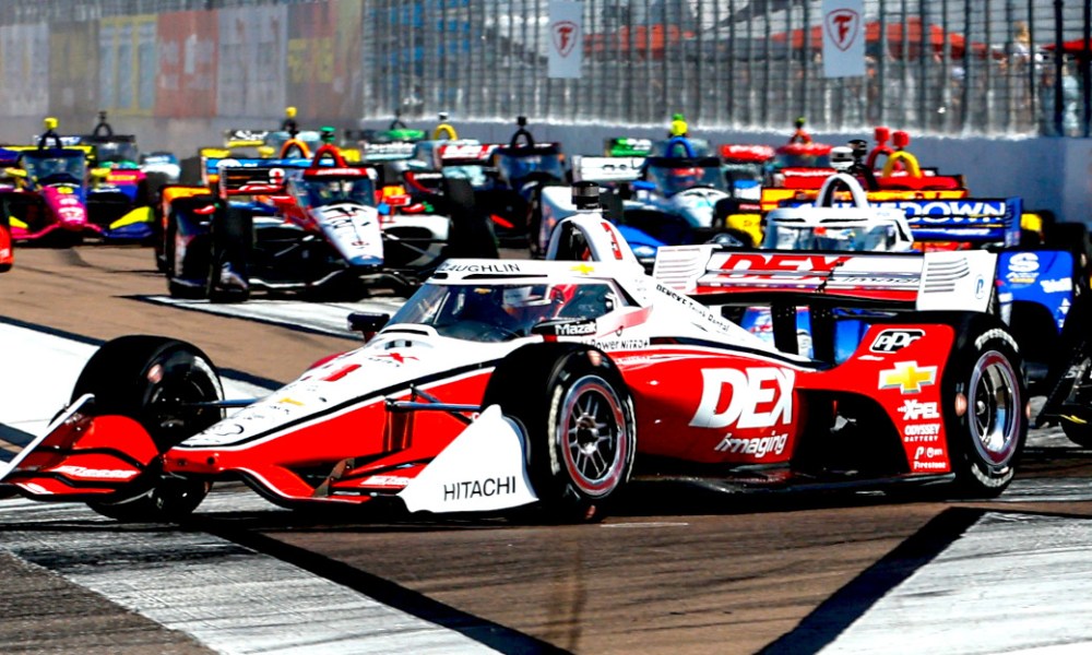 Red and white racecar on track