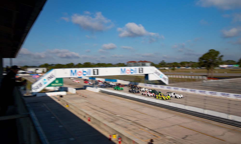 IndyCar racers competing on racetrack